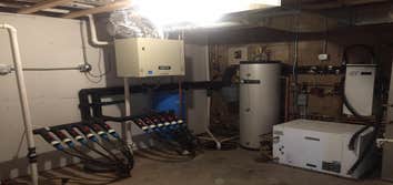 Photo(s) from Airco Heating And Cooling Inc This is an electric boiler system that was piped on a piece of plywood then brought to a remote cabin and i