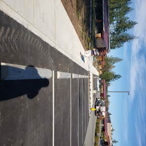 Photos by Metro Sealcoating/striping LLC #3 Restripe existing parking stalls, Pressure wash & Sanitized all hand rail and sidewalks and 3...