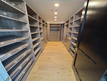 Custom Walk-In Closet Huge custom walk-in closet made with space for shoes, accessories, and of course, clothes!