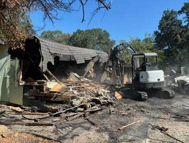 Photos by Webb Land Development #1 Demo and cleanup of burned home, garage, and sheds.