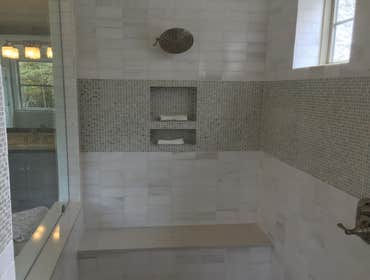 Marble and glass mosaic shower