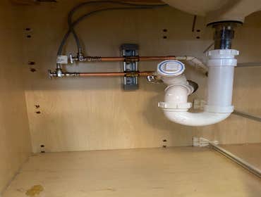 under sink plumbing Is your under sink plumber basic? A upgraded drain, cleanout access and solid pipes and valves could make a world of difference for