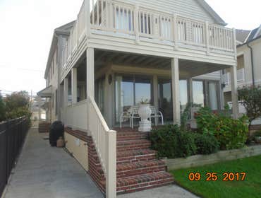 Photos by Saviors Custom Carpentry, Inc #1 Composite steps, vinyl railings & 1x4 azek