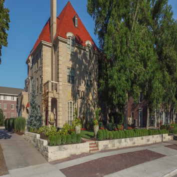 Chi Omega Retaining Wall – Lincoln, NE Installation of 3’ tall engineered retaining wall with proper drainage, footings, and finished landscaping. Scop