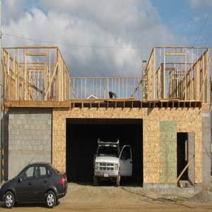 New Construction of 2 story house built using concrete blocks and wood framing