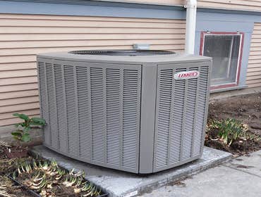 American Standard installation residential This is a recent installation of an American Standard heating and cooling system in a residential setting.