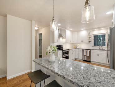 Photos by Best Home Improvements Nw LLC #1 Kitchen Remodel to include - New kitchen design with partition wall removal between kitchen and living area,