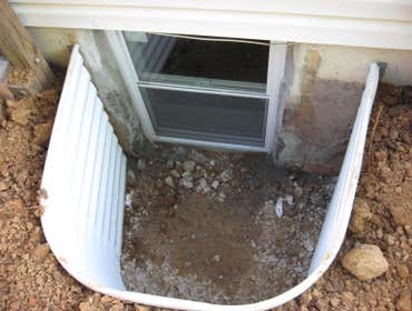 Egress Window Installation from All By Code, LLC Installation of an egress Window in Manassas, VA. Homeowner wanted to reseed and build a flower box s