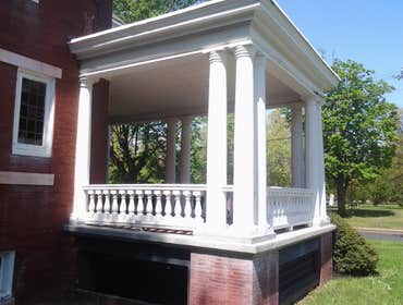 Ext trim and siding Custom corner columns with azek soffit trim and enhancing crown molding with hardboard clapboard siding 7" exposed