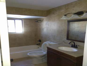 Bathroom Remove tub toilet vanity bar light flooring... install new tub vanity mirror, bar light toilet new wall to wall tiles and new shower housing l
