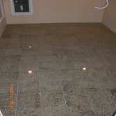 Project photos from Rc Home Improvement Contractors Llc ENTERTAINMENT ROOM:level the floor with mud job, granite on the foor