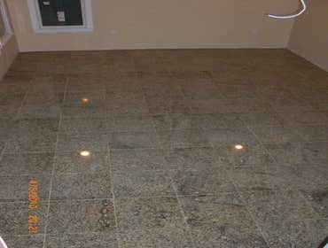 Project photos from Rc Home Improvement Contractors Llc ENTERTAINMENT ROOM:level the floor with mud job, granite on the foor