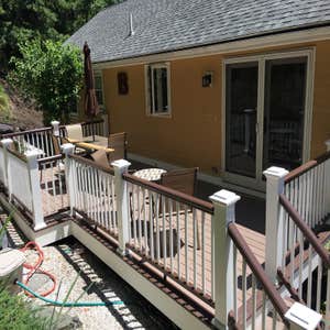 Peabody Deck Azek Silver Oak deck with Kona accent decking and rails.