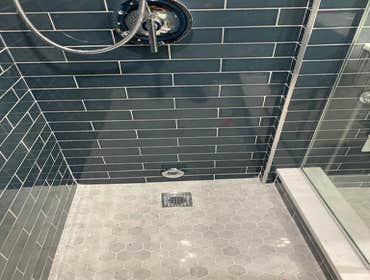 Photos by 2m Mechanical LLC #1 Bathroom plumbing rough shower with overflow set up