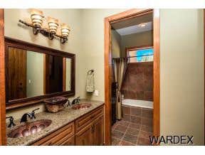 Photos by Sequoia Homes LLC #1 This Tuscan/Mediterranean style home is truly one of Mohave County's finest luxury homes. Over 1 acre of property in the