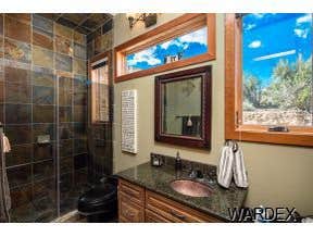 Photos by Sequoia Homes LLC #1 This Tuscan/Mediterranean style home is truly one of Mohave County's finest luxury homes. Over 1 acre of property in the