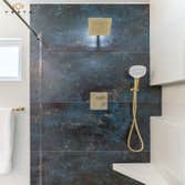 Bathroom Remodel in San Diego This project involved a complete reconfiguration of the primary bathroom and walk-in closet. The homeowners wanted to sep