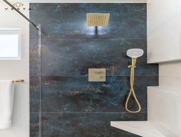 Bathroom Remodel in San Diego This project involved a complete reconfiguration of the primary bathroom and walk-in closet. The homeowners wanted to sep