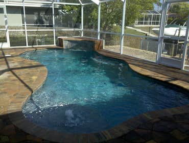 Project photos from Waters Edge Pools, LLC New Construction Swimming Pools