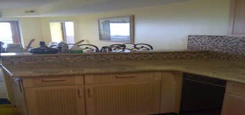 Glass tile backsplash.