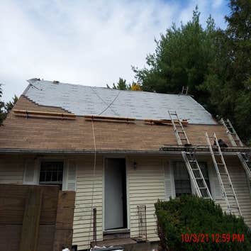 Photos by Property Care LLC #1 Roof replacement 16 pitch