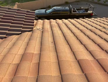 Photos by Jilek Roofing #1 Removed tiles above roof leak area. Replace roof tile underlayment and replace roof tile.