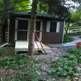 small shed building with walk