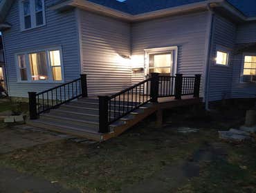 Deck Renovation Demo and remove existing rotting and destroyed front porch. Releveled ground, Rebuild deck and staircase frame using pressure treated e
