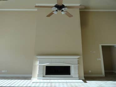 Photo(s) from Painting Services By Steve Before and after stone fireplace