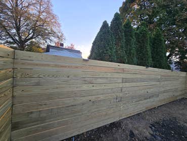 Photos by Rojas Landscaping & Handyman Services LLC #1 Preasure Threated Wood Horizontal Fence Installation
Exterior Fire Place
Paavers Patio/walkway