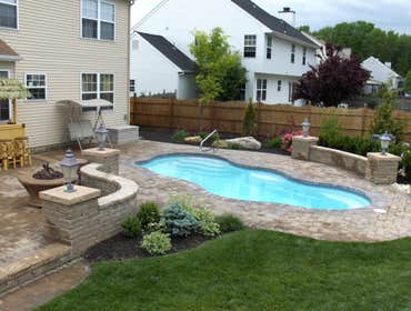 16 Robinhood Dr. Medford, N.J.08055 Installed Viking Figi Pool w/Travertine pool deck