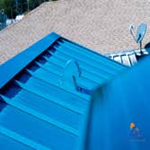 Metal Roof Replacement with Attic Vent Installation