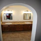 Brookwood Remodel Remodeled two bathroom and refinished custom cabinetry.