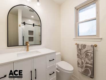 Tranquil Nook- Bathroom Remodel Transform your guest bathroom into a chic and inviting space with this stylish remodel. The highlight of this design is
