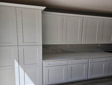 Fine Design Remodeling resume painting, frame, tile, cabinet install, shower, more.