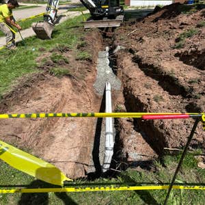 220 feet of Storm Sewer Install 200 feet of storm sewer connecting to 5 down spouts