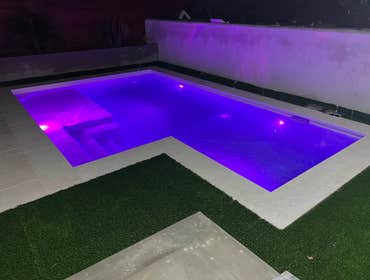 Photos by American Way Remodeling #1 New construction underground swimming pool.