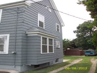 Brilliant Painting, LLC Exterior Project 1 Before and after photos of a full house that has been power washed, scraped, hand sanded, primed, and painte