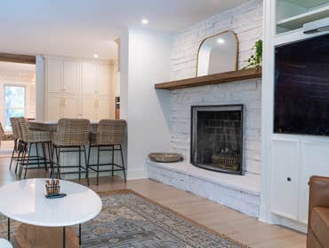 Photos by Albrecht, LLC #1 Through strategic space planning, thoughtful material selections, and custom craftsmanship, this first-floor renovation tran