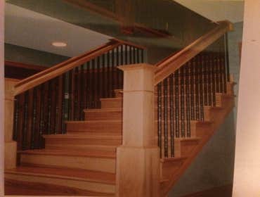 Staircase and rails with iron balusters
