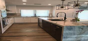 Photos by Luxury Interiors and More #1 granite, marble,quartz slabs for kitchen countertops and bathrooms