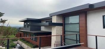 Photos by Outermost Constuction Technologies LLC #1 We delivered a modern, energy-efficient, no-maintenance façade solution with ACM panels, durable me