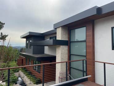 Photos by Outermost Constuction Technologies LLC #1 We delivered a modern, energy-efficient, no-maintenance façade solution with ACM panels, durable me