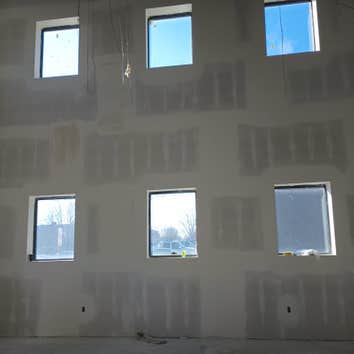 Photos by Crazy Kings Construction #1 30 foot tall walls framed and drywalled by us