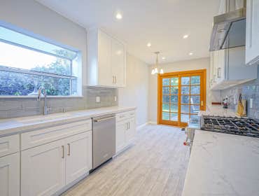 Complete Kitchen Remodeling Woodland Hills Complete kitchen remodeling, white shaker style cabinet with quartz countertop.