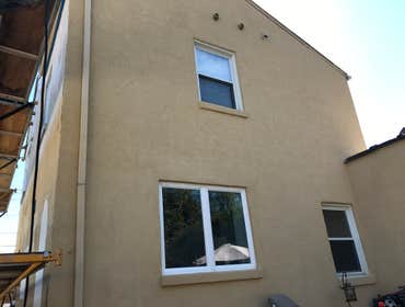 Stucco resurface in Bridgeville We recoated two sides of a house that was stuccoed 30+ years ago. We used mesh and imbedded it into the basecoat. Then 