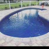 Photos by Adventure Pool N Spa #1 New finish with dolphins and pumps and filter