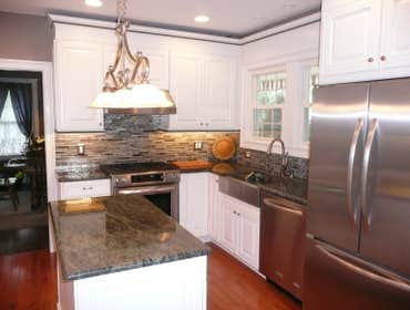 KITCHEN #1 This was a total kitchen remodel in a 100 year old house. Included was:
-Hardwood flooring
-Electrical service upgrade
-Under cabinet an