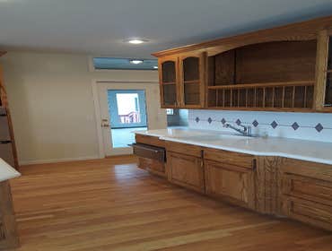 Johnson Drive house Complete paint job performed inside house in all rooms also several items repaired through out house with new light fixtures wood f