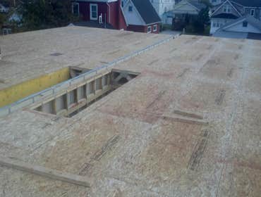 Photos by Teagan Homes #1 New construction of two townhomes sold to individuals for about $450000 each unit. Profit margin was over $250,000 in less th